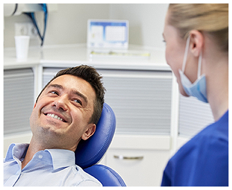 Patient Smiling at Hygienist in Goldsboro, NC 